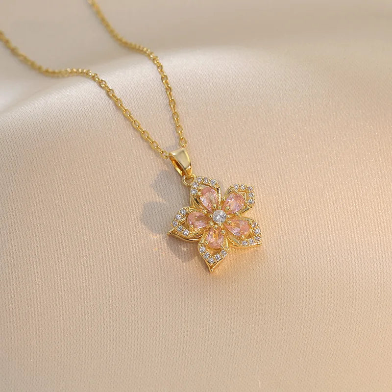 The Twirl Pendant — Rotating Flower Necklace