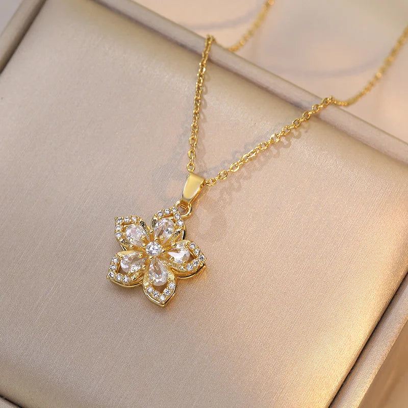 The Twirl Pendant — Rotating Flower Necklace